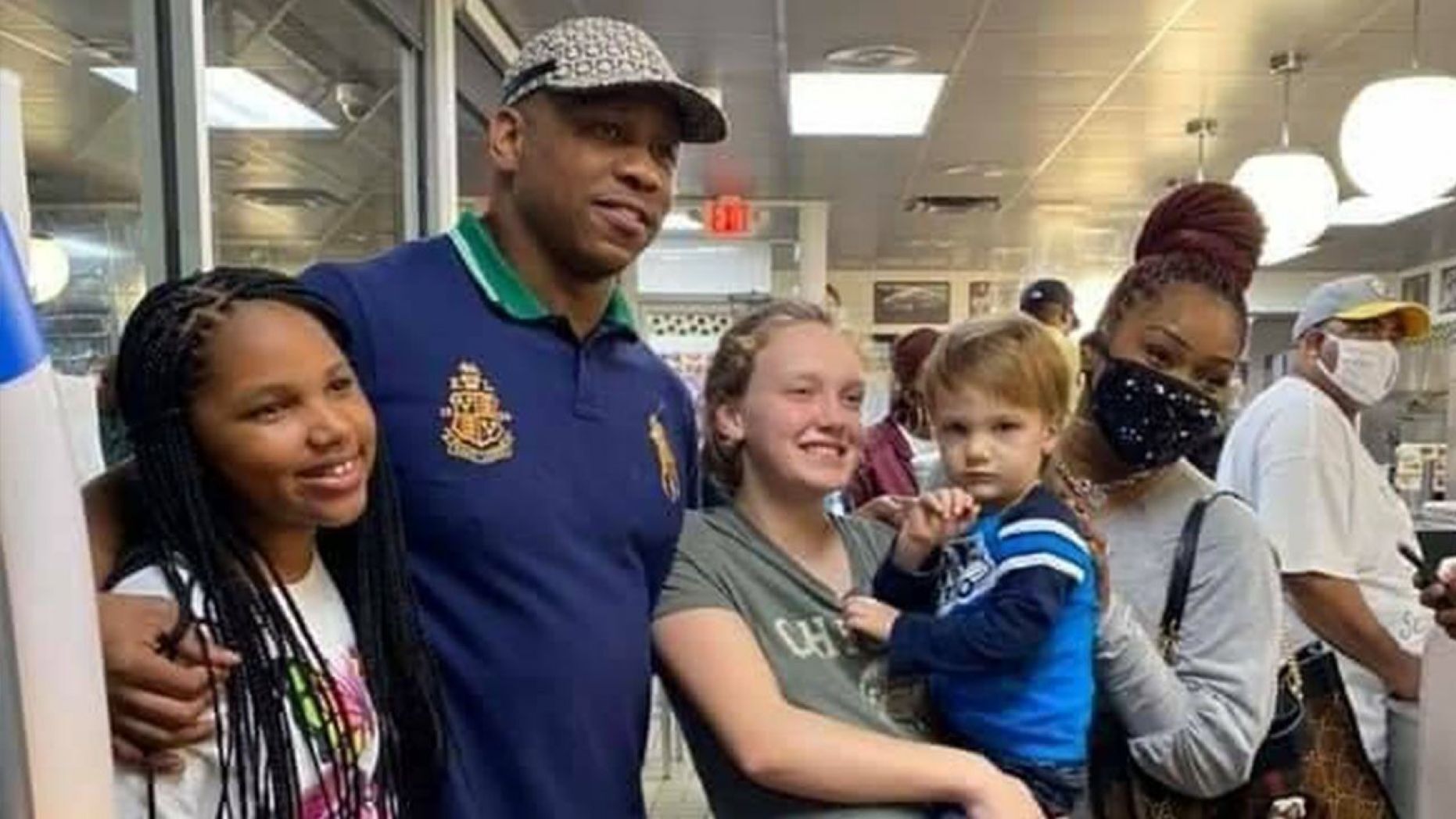 Eusebio Phelps poses with Waffle House waitress
